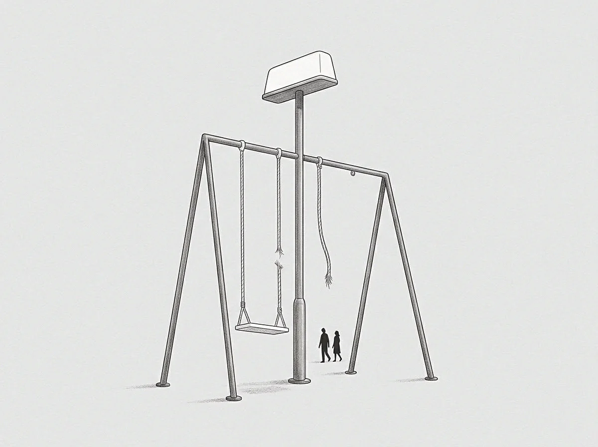A central post bisects a swing frame while two human figures walk past the detached and fraying ropes.